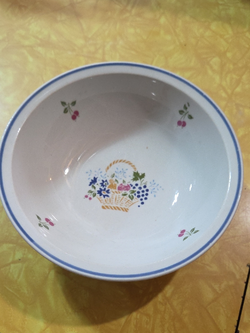 #15 White Ceramic Bowl with Floral Basket Motif and Blue Rim